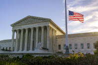 The flag flies at half-staff at the Supreme Court on the morning after the death of Justice Ruth Bader Ginsburg, 87, Saturday, Sept. 19, 2020 in Washington. (AP Photo/J. Scott Applewhite)