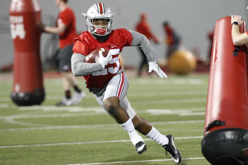 Ohio State running back Mike Weber runs the ball during spring NCAA college football practice Tuesday, March 7, 2017, in Columbus, Ohio. (AP Photo/Jay LaPrete)