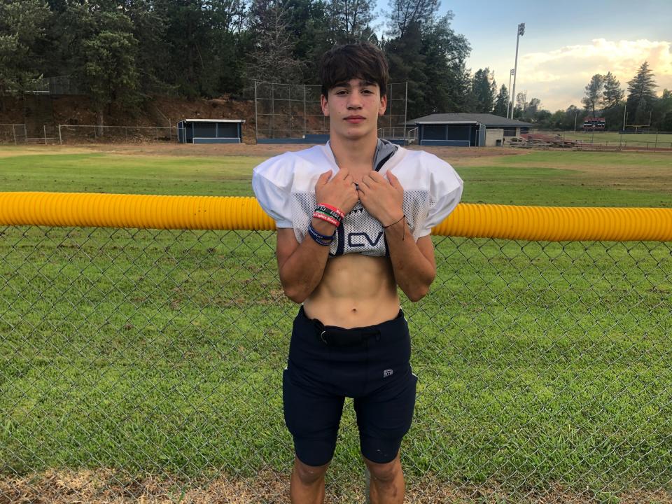 Central Valley freshman running back and defensive back Drason Recio holds his shoulder pads after practice on Wednesday, Aug. 3, 2022.