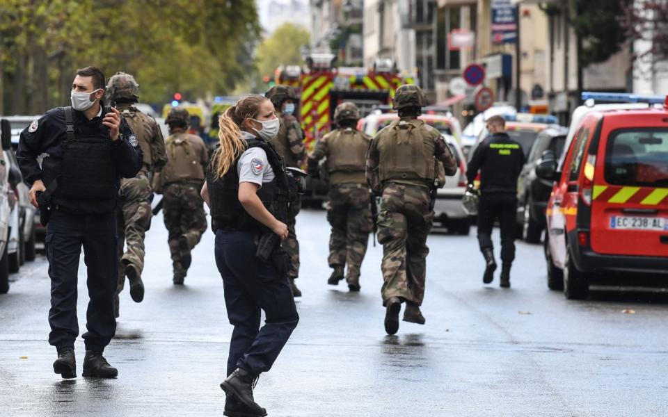 French soldiers were seen rushing towards the scene of the attack - ALAIN JOCARD /AFP