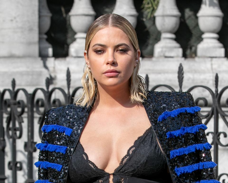 While Cara Delevingne walked the Balmain fashion show during Paris Fashion Week on Friday, rumored girlfriend Ashley Benson looked on from the audience.