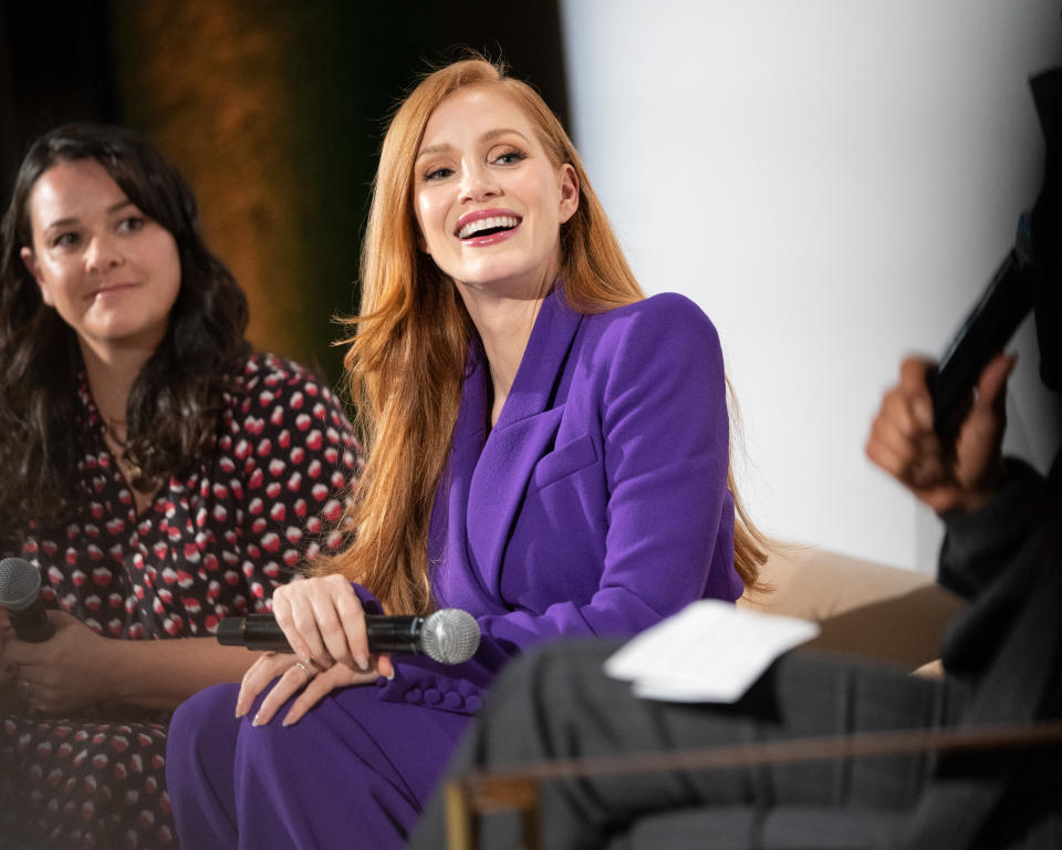 Jessica Chastain speaks to Kelly Carmichael andNischelle Turner during a panel at Marie Claire's 2022 Power Trip summit.