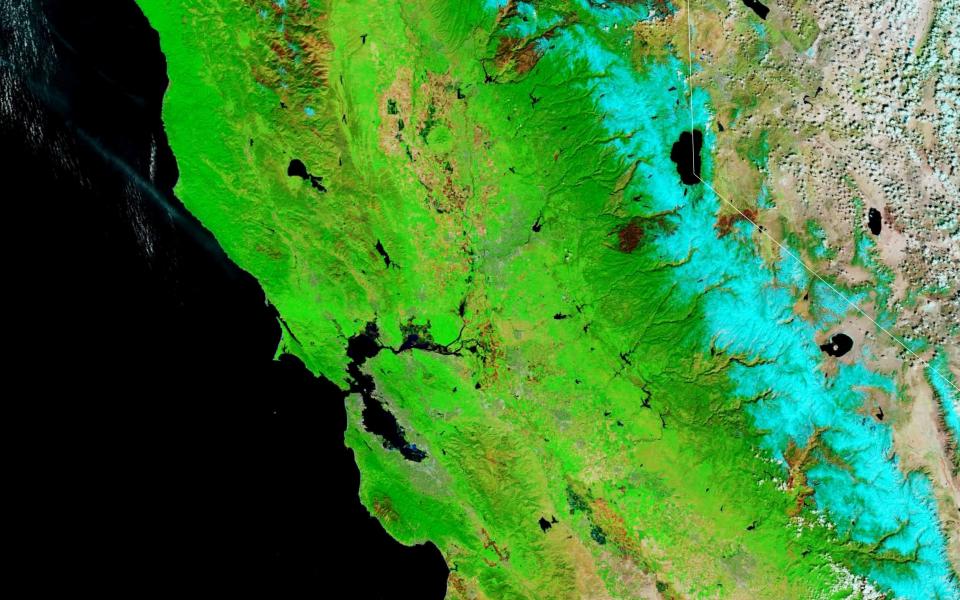 Satellite image of San Joaquin Valley showing snow amount in light blue on March 16, 2022.