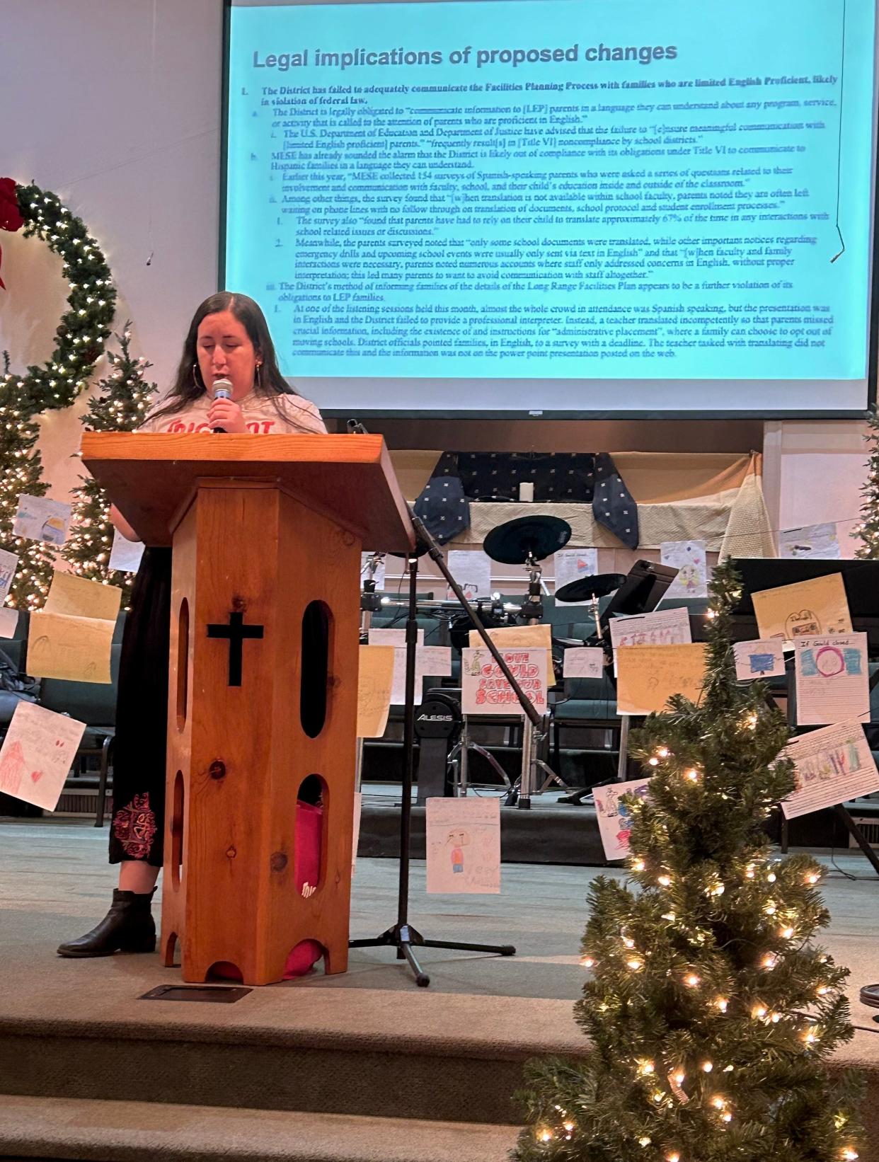 Migrant Equity Southeast (MESE) Director of Operations and Outreach, Christina Magaña details legal implications that MESE feel SCCPSS's Long-Range Facilities Plan opens the district up to. She spoke on Nov. 29, 2023 at the Gould meeting at Silk Hope Baptist Church.