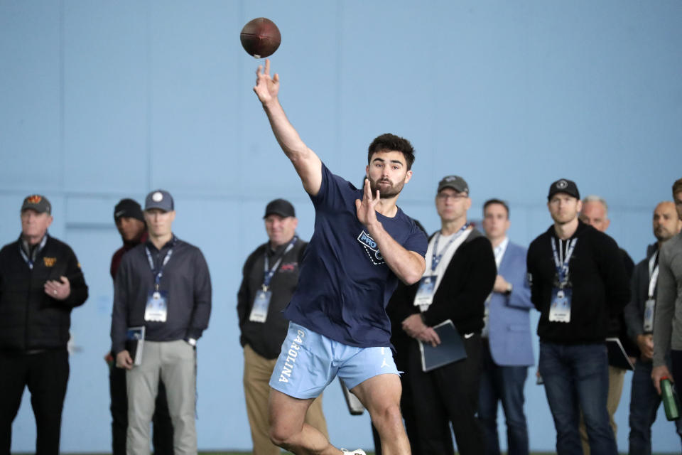 North Carolina quarterback Sam Howell demonstrates his skills for NFL football scouts during Pro Day, Monday, March 28, 2022, in Chapel Hill, N.C. (AP Photo/Chris Seward)