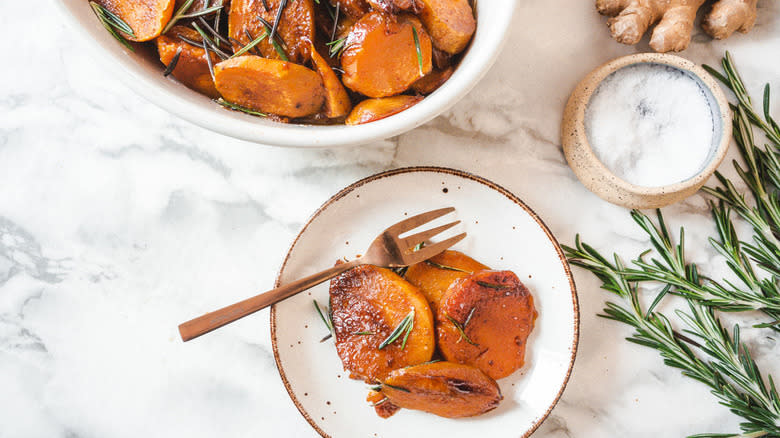 Yams with fresh ginger and rosemary sprigs