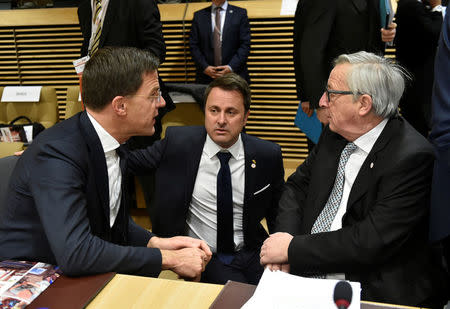 Dutch Prime Minister Mark Rutte talks with his Luxembourg counterpart Xavier Bettel and European Commission President Jean-Claude Juncker during a High Level Conference on the Sahel in Brussels, Belgium, February 23, 2018. REUTERS/John Thys/Pool