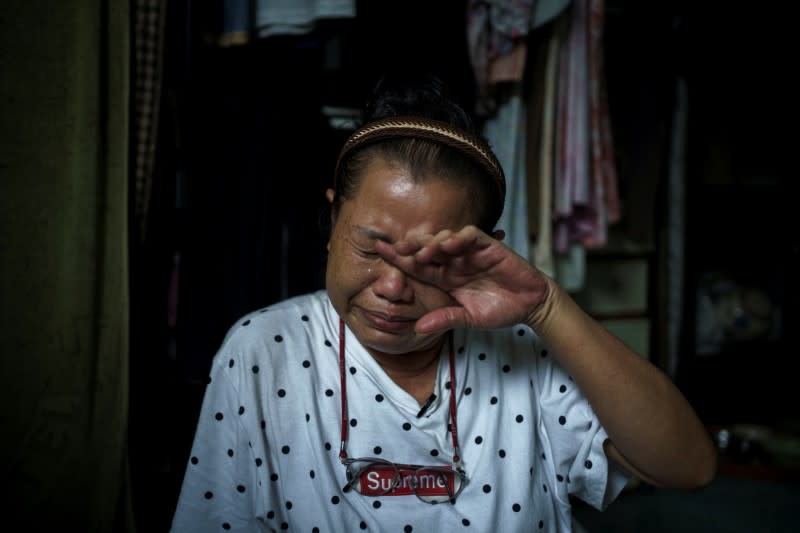 Foto de Unyakarn Booprasert, de 59 años y quien sobrevivió tras tratar de suicidarse fuera del Ministerio de Finanzas de Tailandia