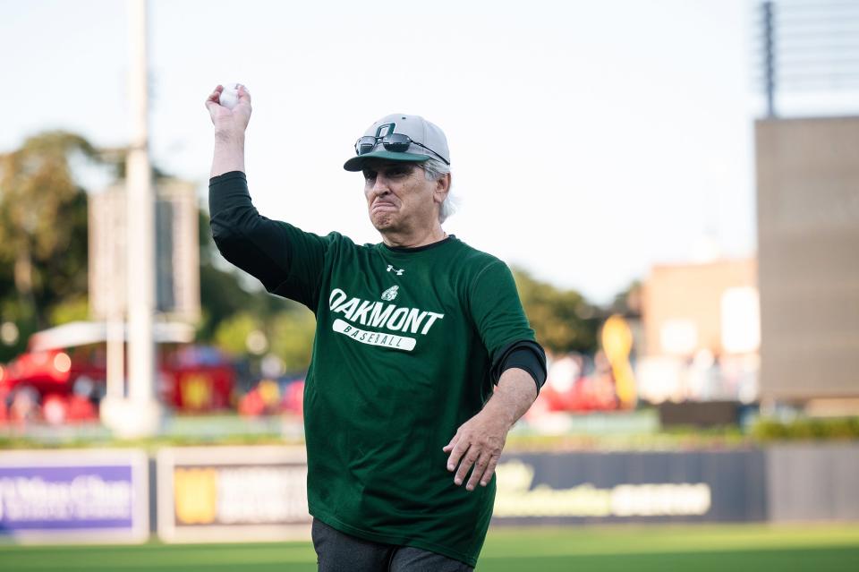 Oakmont assistant coach Gregg Picucci, who has coached baseball in Central Massachusetts for 50 years, throws out a first pitch before Thursday night's WooSox game at Polar Park.