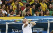 Brazil's coach Luiz Felipe Scolari reacts as his team plays against the Netherlands during their 2014 World Cup third-place playoff at the Brasilia national stadium in Brasilia July 12, 2014. REUTERS/Ueslei Marcelino