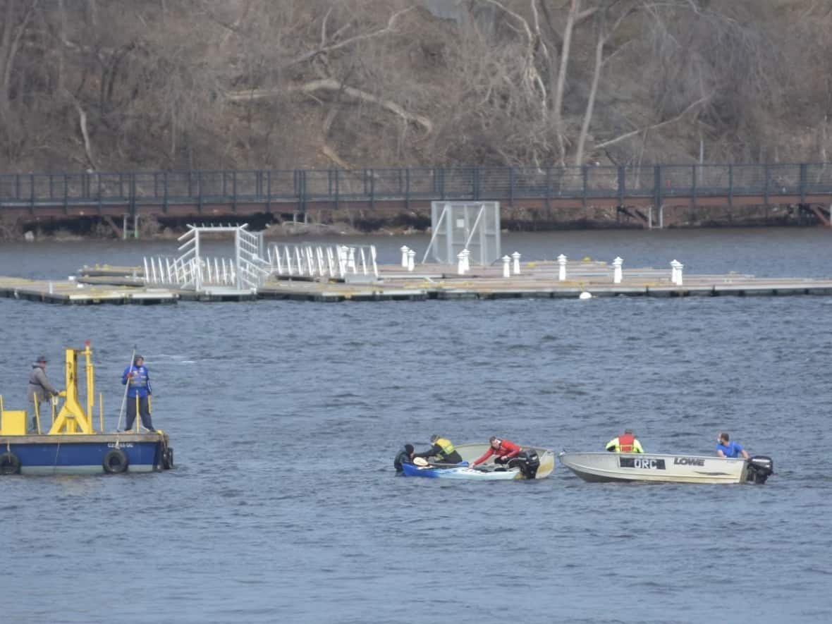 A kayaker was rescued from the Ottawa River Sunday morning. A spokesperson for Ottawa Fire Services says much of the credit goes to the Ottawa Rowing Club, which launched a boat and reached the kayaker first. (Jean Lalonde/Ottawa Fire Services  - image credit)