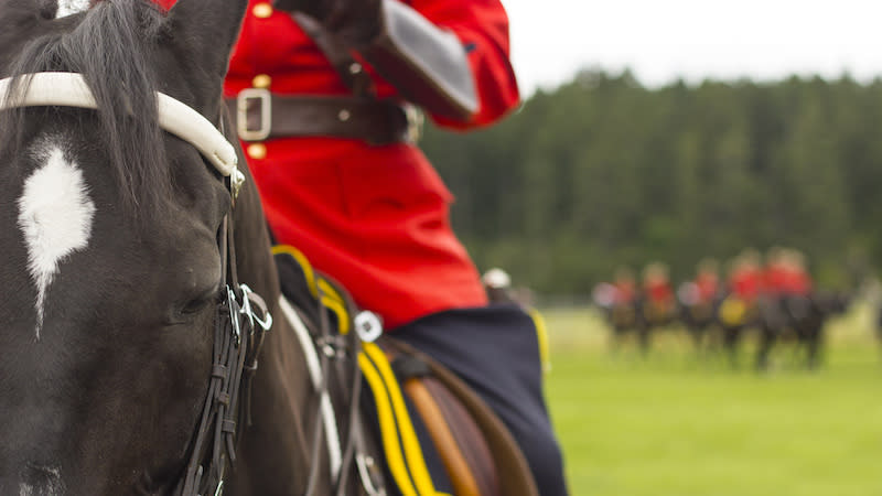 An RCMP officer is seen here on a horse during a training session in Canada. The government has set aside $100,000,000 to pay for a historic class-action lawsuit against the police force. (Getty Images)