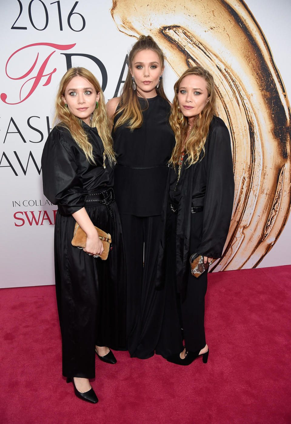 Ashley, Elizabeth, and Mary-Kate Olsen all in The Row.