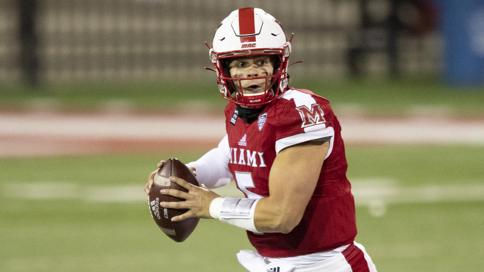 Miami (Oh) Redhawks quarterback Brett Gabbert (5) during an NCAA football game against the Ball State Cardinals on Wednesday, Nov. 4, 2020 in Oxford, Ohio. (AP Photo/Emilee Chinn)