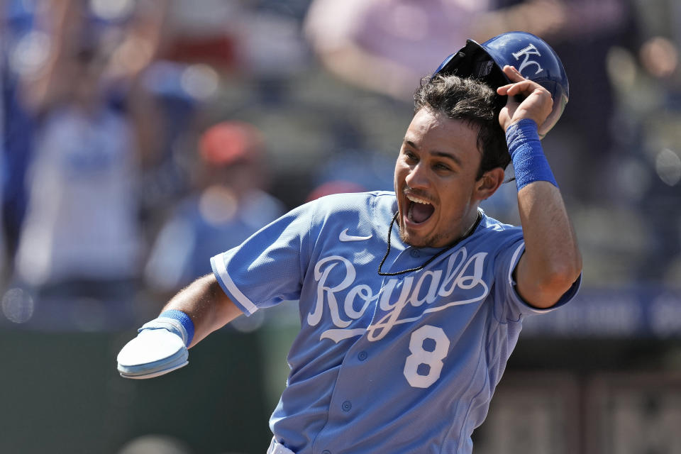 Kansas City Royals' Nicky Lopez celebrates after scoring the game-winning run on a two-run double by Freddy Fermin during the tenth inning of a baseball game against the Cleveland Guardians Thursday, June 29, 2023, in Kansas City, Mo. The Royals won 4-3 in ten innings. (AP Photo/Charlie Riedel)