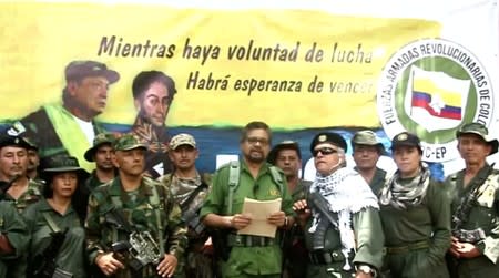 FILE PHOTO: Former FARC commander known by his alias Ivan Marquez reads a statement that they will take they insurgency once again