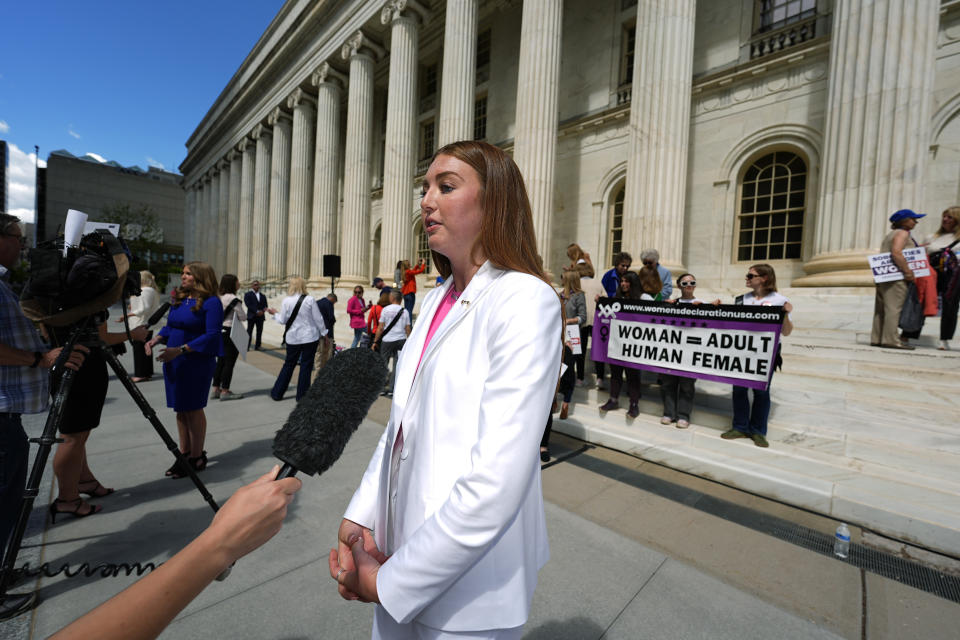 FILE - Hannah Holtmeier, one of six plaintiffs in a lawsuit against Kappa Kappa Gamma sorority, talks to reporters after a news conference outside the United States Court of Appeals for the Tenth Circuit, May 14, 2024, in Denver. A federal appeals court on Wednesday, June 12 dismissed a lawsuit challenging a transgender woman's acceptance into a sorority at the University of Wyoming. (AP Photo/David Zalubowski, file)