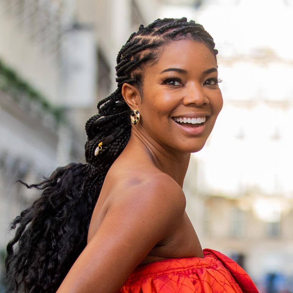 Box braids in a low ponytail is pretty much a standard look. But the way Gabrielle Union's are styled here here is anything but basic. Hers pulled back into what looks like a larger french braid, tied off below the nape of her neck so the ends hang loose. Just gorgeous.