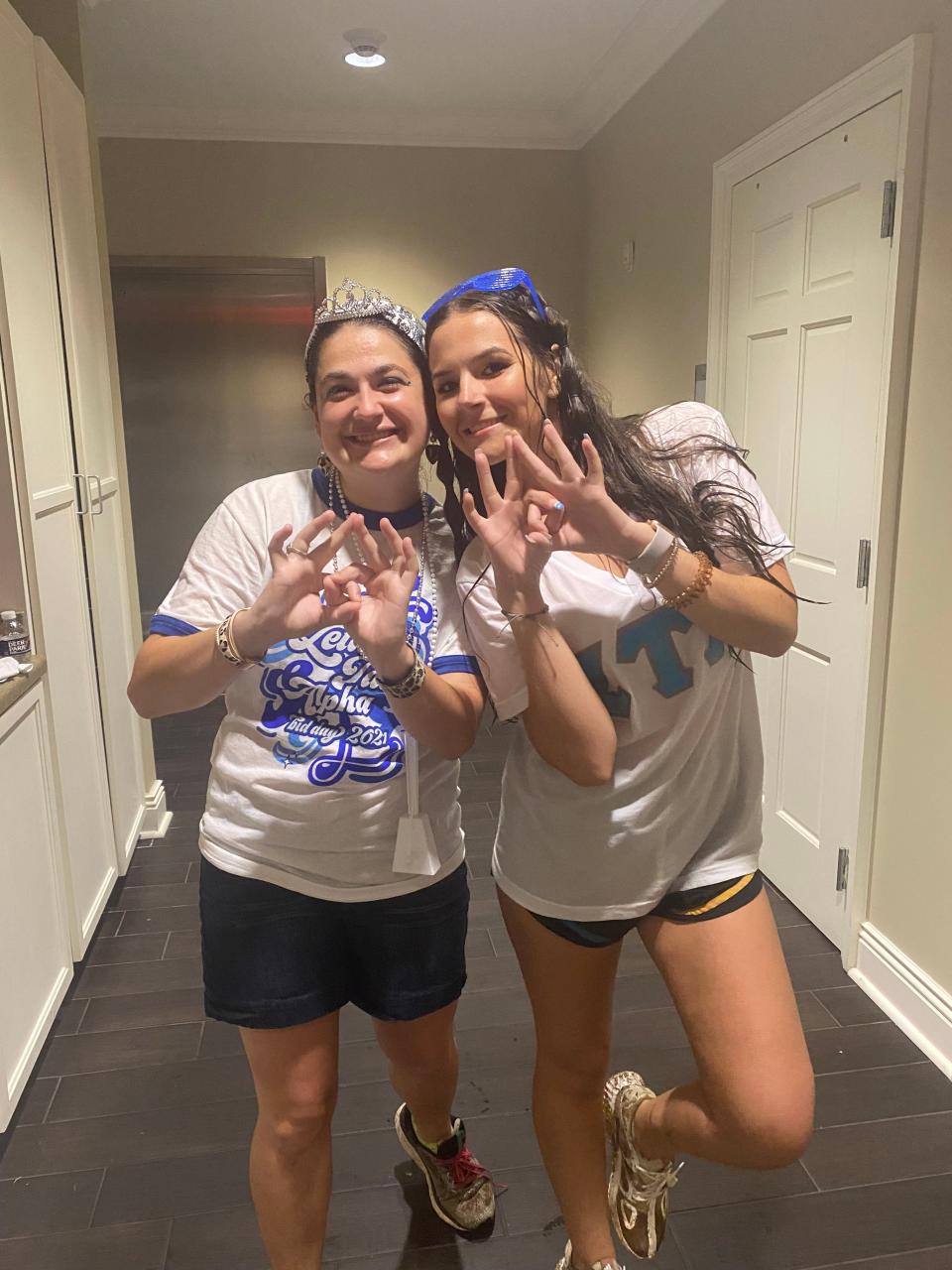 UT FUTURE student Faith Irwin poses for a photo with a member of Zeta Tau Alpha on Bid Day in Knoxville, Tennessee.