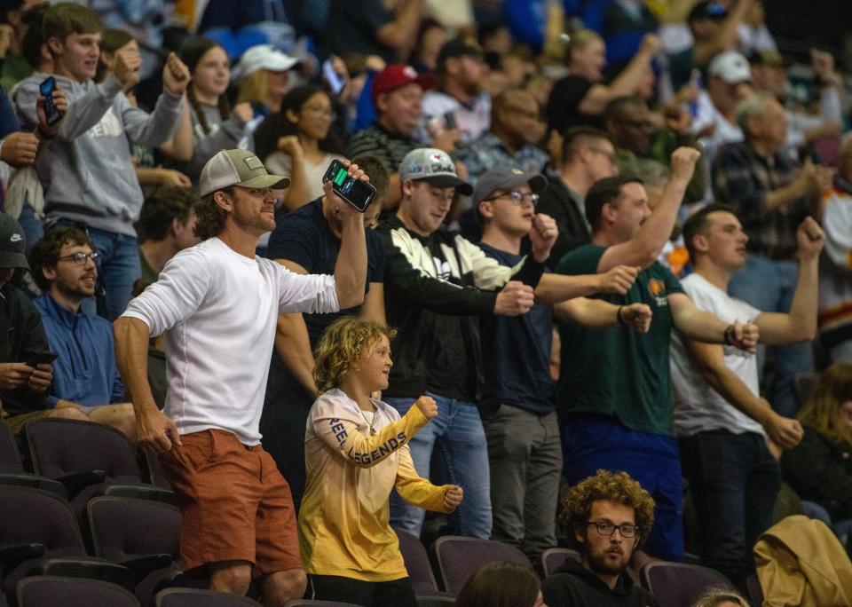 Ice Flyers fans celebrate a goal as the Ice Flyers take on the Evansville Thunderbolts at the Pensacola Bay Center Saturday, March 25, 2023.