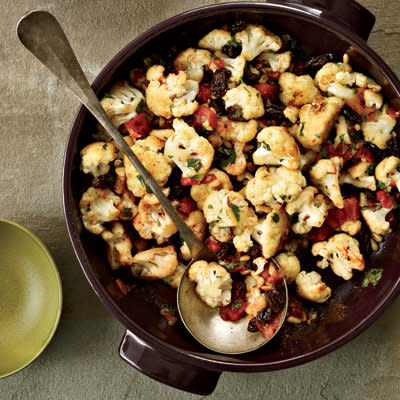 <strong>Get the <a href="http://www.huffingtonpost.com/2011/10/27/pan-roasted-cauliflower-w_n_1058594.html">Pan-Roasted Cauliflower with Pine Nuts and Raisins Recipe</a></strong>