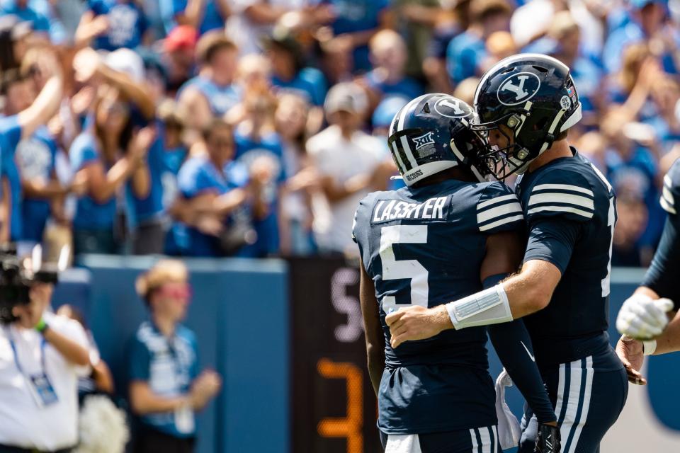 Brigham Young Cougars wide receiver Darius Lassiter (5) celebrates his touchdown during the football game against the Southern Utah Thunderbirds at LaVell Edwards Stadium in Provo on Saturday, Sept. 9, 2023. | Megan Nielsen, Deseret News