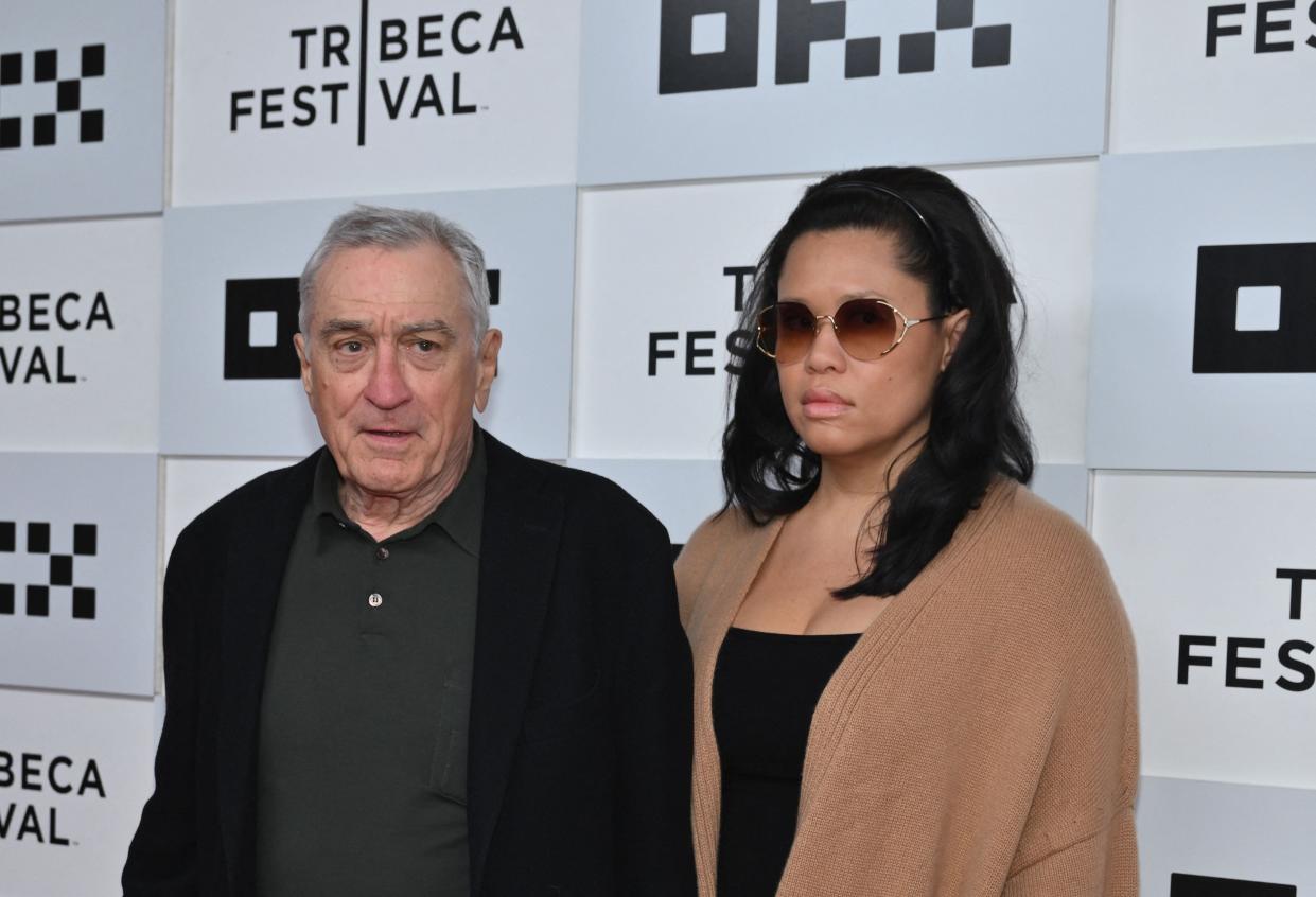 Robert De Niro and his girlfriend Tiffany Chen arrive to the screening of "Kiss the Future" during the opening night of the Tribeca Film Festival at OKX Theater in New York City on June 7.