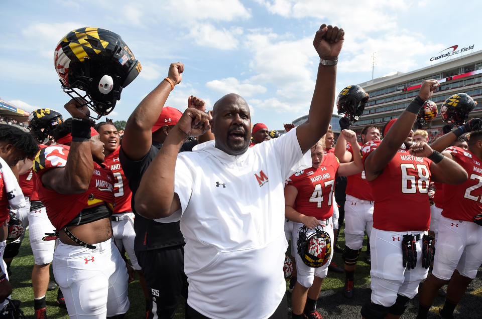 Michael Locksley celebrates with his team.