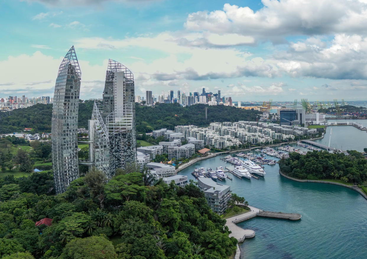 The Keppel Bay area in Singapore, illustrating a story on Singaporeans sacrificing luxury items to generate more wealth.