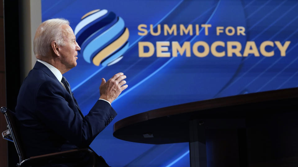 President Joe Biden speaks from the South Court Auditorium on the White House complex in Washington, Thursday, Dec. 9, 2021, for the opening of the Democracy Summit.The two-day virtual summit is billed as an opportunity for leaders and civil society experts from some 110 countries to collaborate on fighting corruption and promoting respect for human rights. (AP Photo/Susan Walsh)