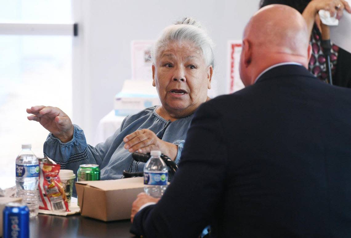 The Link @ Blackstone resident Mary Ayala, left, chats with Fresno Mayor Jerry Dyer after a ribbon-cutting ceremony was held for the new senior community center Monday, Nov. 28, 2022, in Fresno. Ayala was happy to have a place to socialize.