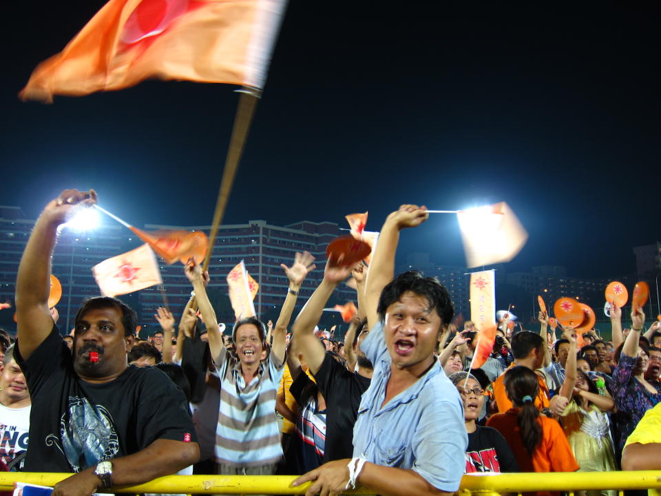 Crowd cheering at the NSP rally on 1 May at the Jurong West Stadium. (Yahoo! photo/ Ewen Boey)