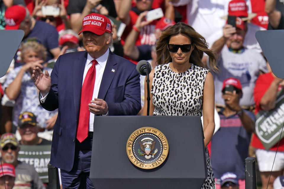 President Donald Trump and first lady Melania Trump arrive for a campaign rally Thursday, Oct. 29, 2020, in Tampa, Fla. (AP Photo/Chris O'Meara)