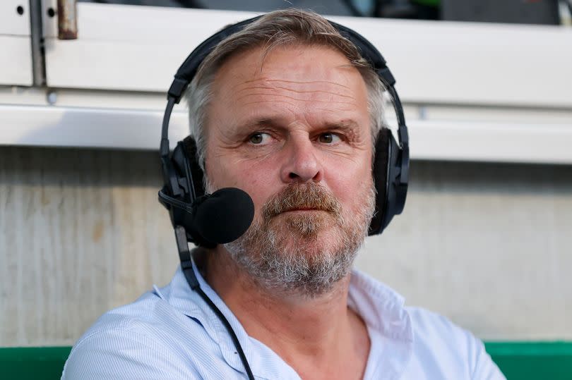 Didi Hamann wearing a headset while on punditry duty.