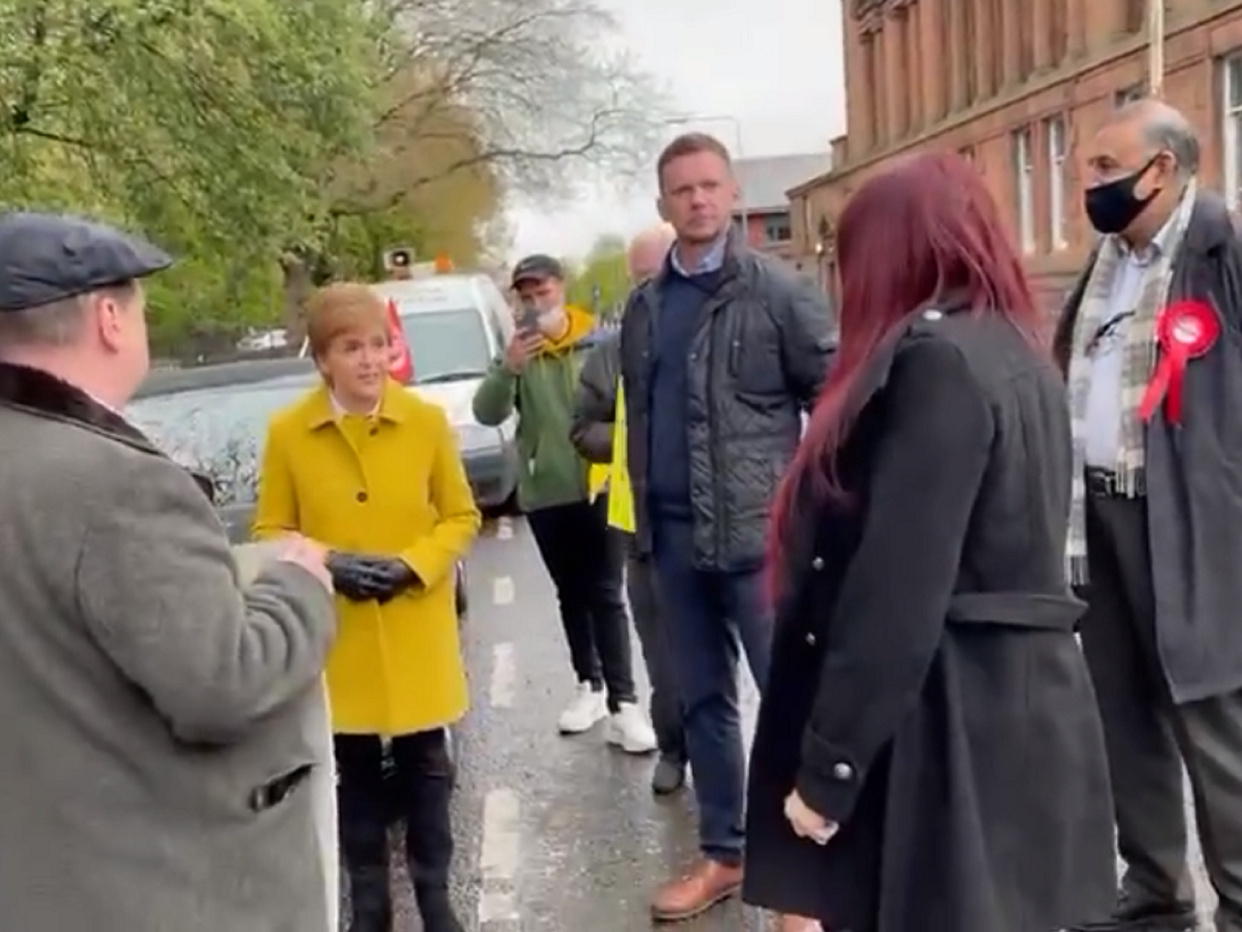 Scotland’s first minister Nicola Sturgeon calls ex-Britain First deputy leader Jayda Fransen a “racist” during a confrontation in Glasgow (Screen grab/Twitter)