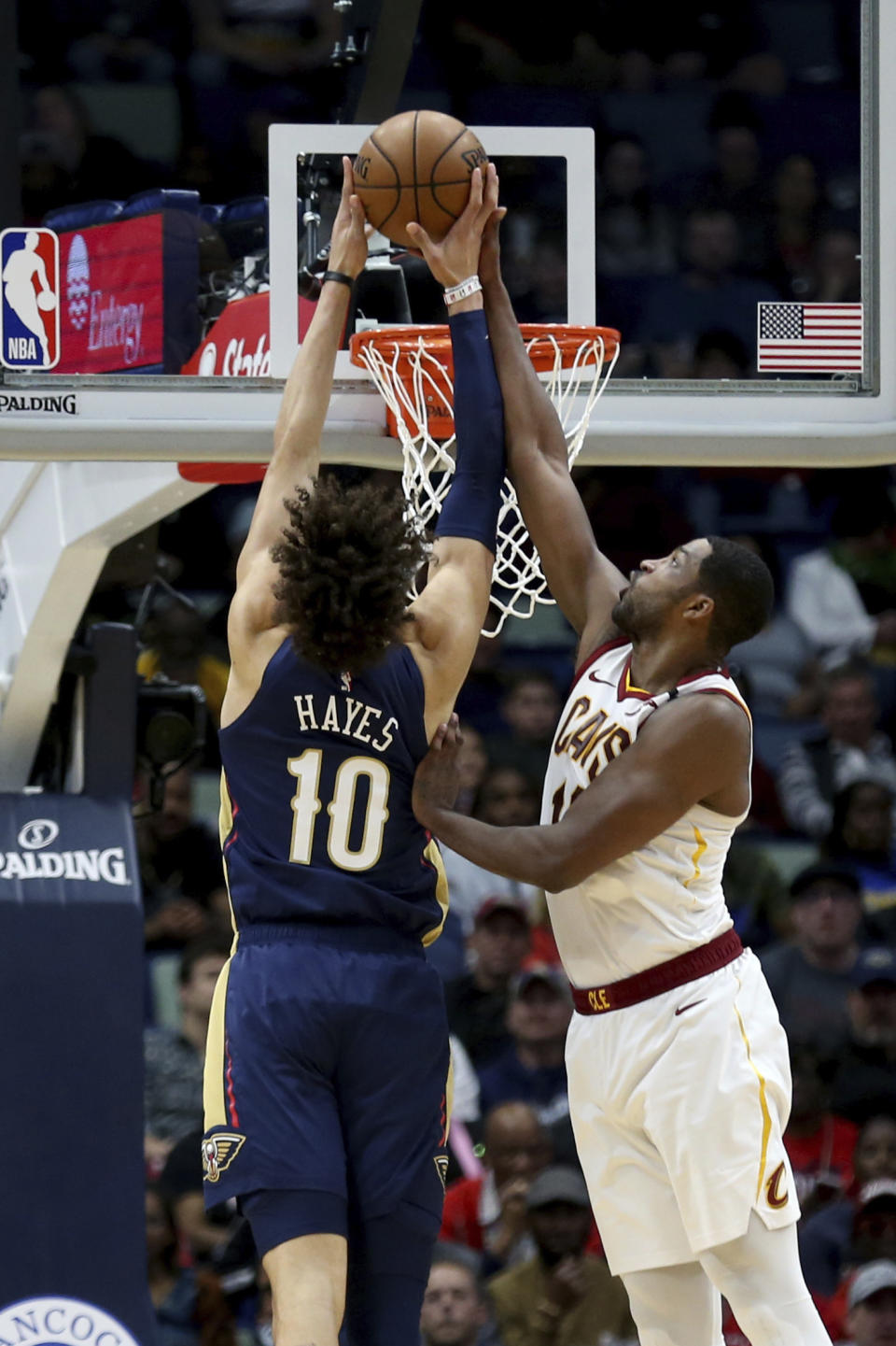 Cleveland Cavaliers center Tristan Thompson (13) blocks a shot by New Orleans Pelicans center Jaxson Hayes (10) during the first half of an NBA basketball game in New Orleans, Friday, Feb. 28, 2020. (AP Photo/Rusty Costanza)