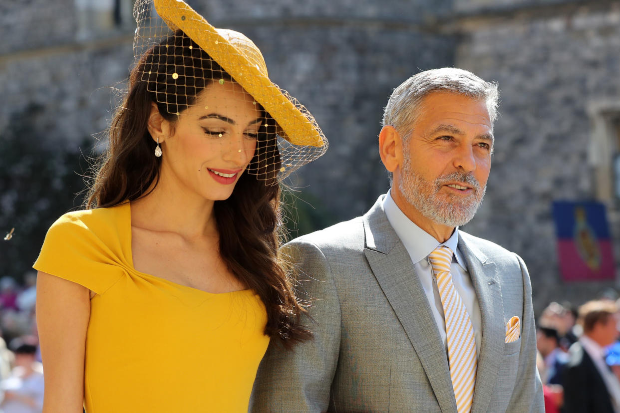 Amal Clooney and husband George Clooney have arrived for the royal wedding [Photo: Getty]