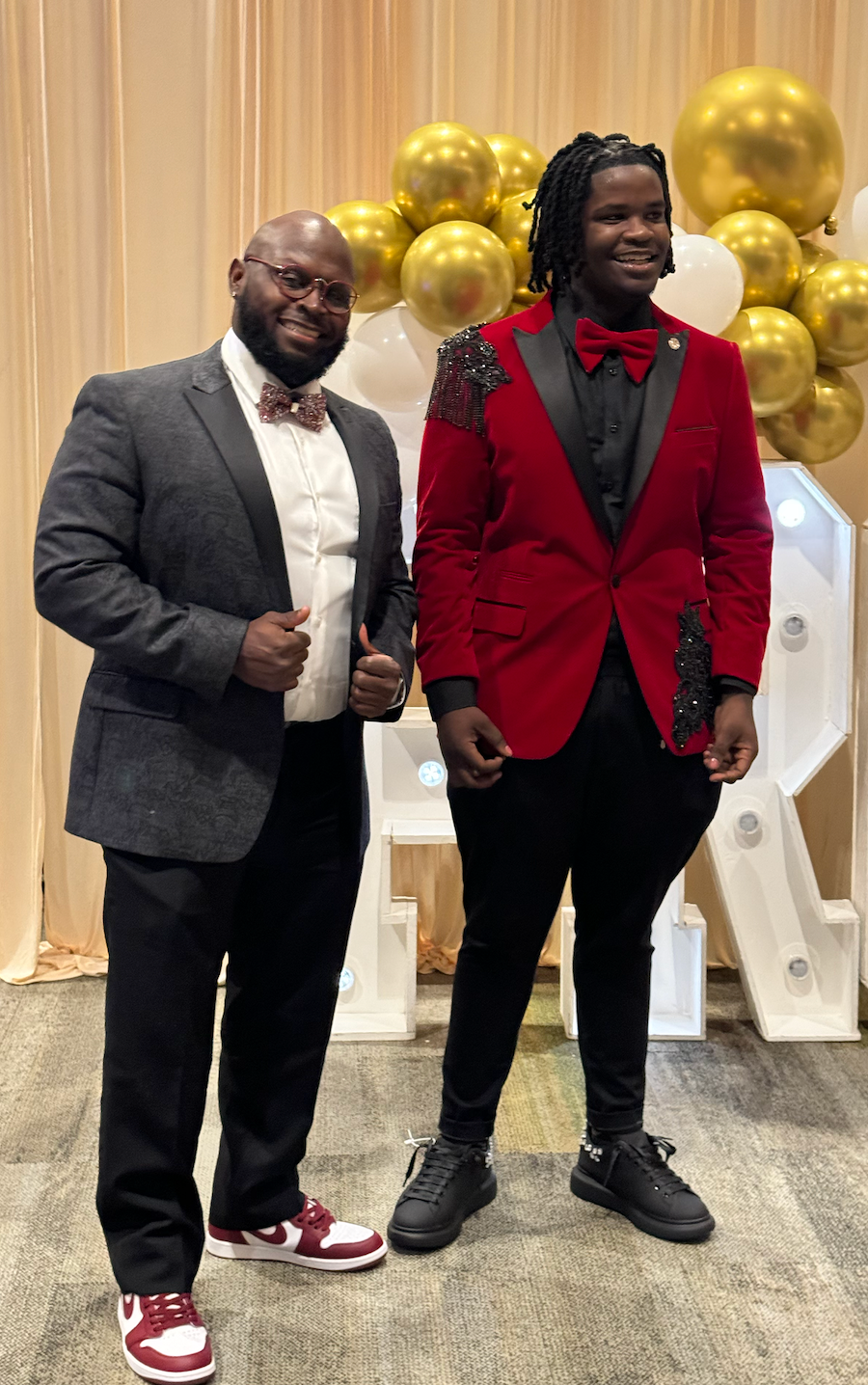 Rodrick Collins with principal Julius Blackburn at the Fairley High School prom.