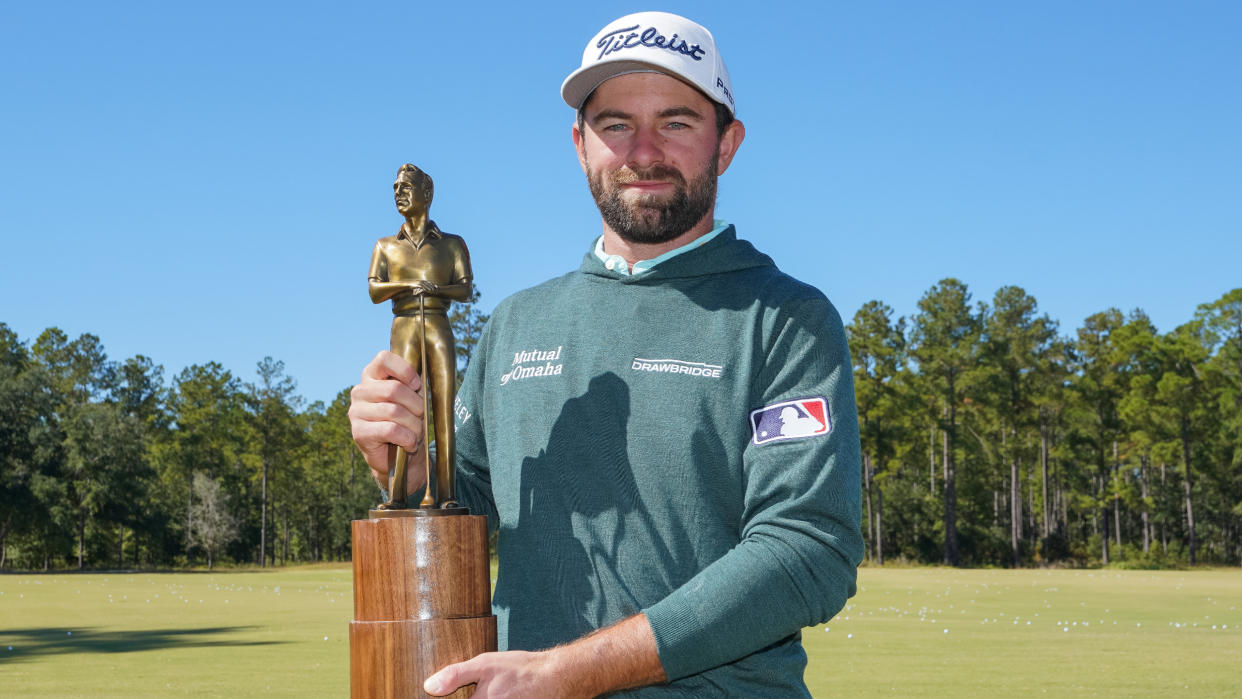  Cameron Young with the PGA Tour Rookie of the Year award 