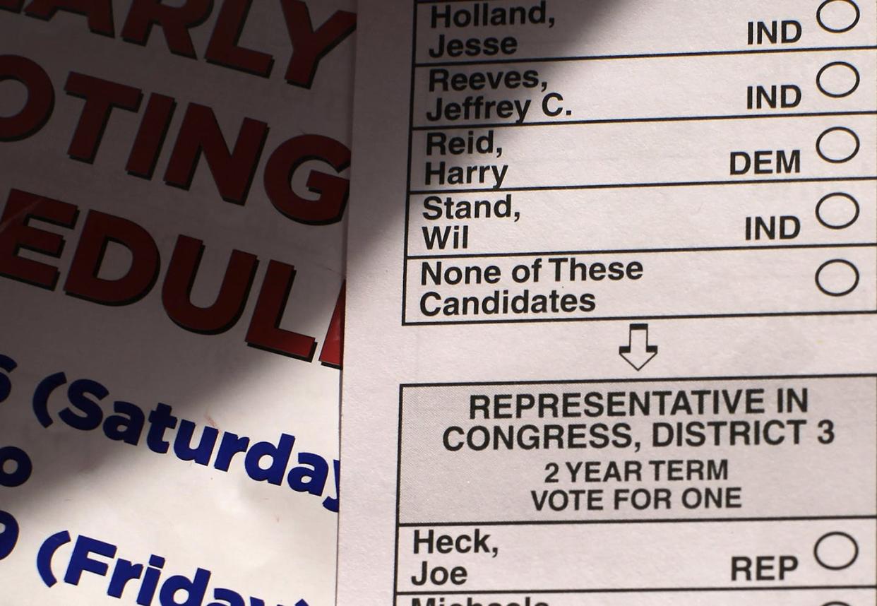 In Nevada, voters can cast a ballot for 'None of These Candidates' in statewide election races. <a href="https://newsroom.ap.org/detail/NevadaVoteNoOne/08226e717e1841fcb511b68ed81f6a25/photo" rel="nofollow noopener" target="_blank" data-ylk="slk:AP Photo/Julie Jacobson;elm:context_link;itc:0;sec:content-canvas" class="link ">AP Photo/Julie Jacobson</a>