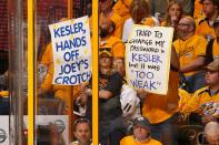 <p>Nashville Predators fans hold signs during the first period in Game Three of the Western Conference Final between the Anaheim Ducks and the Nashville Predators during the 2017 Stanley Cup Playoffs at Bridgestone Arena on May 16, 2017 in Nashville, Tennessee. (Photo by Frederick Breedon/Getty Images) </p>