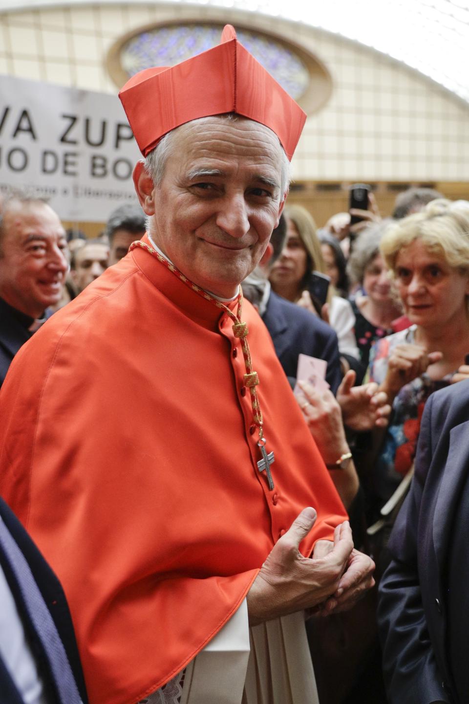 Cardinal Matteo Maria Zuppi meets relatives and friends after he was elevated to cardinal by Pope Francis, at the Vatican, Saturday, Oct. 5, 2019. Pope Francis has chosen 13 men he admires and whose sympathies align with his to become the Catholic Church's newest cardinals. (AP Photo/Andrew Medichini)