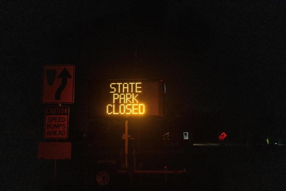 A sign reads that the state park is closed at the entrance of Fairfield Lake State Park on Feb. 27, 2023.
