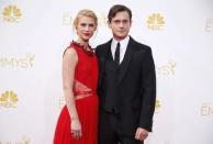 Claire Danes from the Showtime series "Homeland" and her husband, Hugh Dancy, arrive at the 66th Primetime Emmy Awards in Los Angeles, California August 25, 2014. REUTERS/Lucy Nicholson