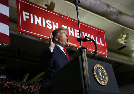 U.S. President Donald Trump speaks during a campaign rally at El Paso County Coliseum in El Paso, Texas, U.S., February 11, 2019. REUTERS/Leah Millis