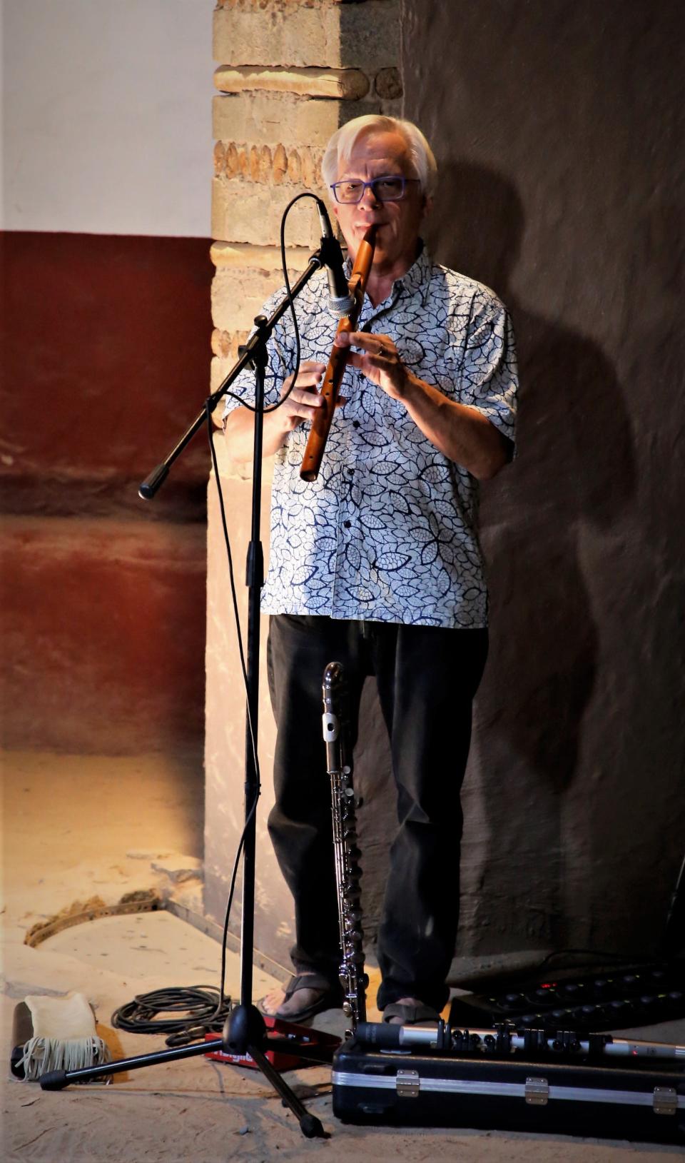 Ferdi Serim, the founder of New Mexico Family and Community Engagement Solutions, plays the flute during a performance on Friday Aug. 25 in the Great Kiva at Aztec Ruins National Monument.