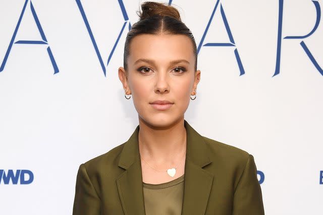 <p>Dimitrios Kambouris/Getty</p> Millie Bobby Brown attends the 2019 WWD Beauty Inc Awards at The Rainbow Room on December 11, 2019