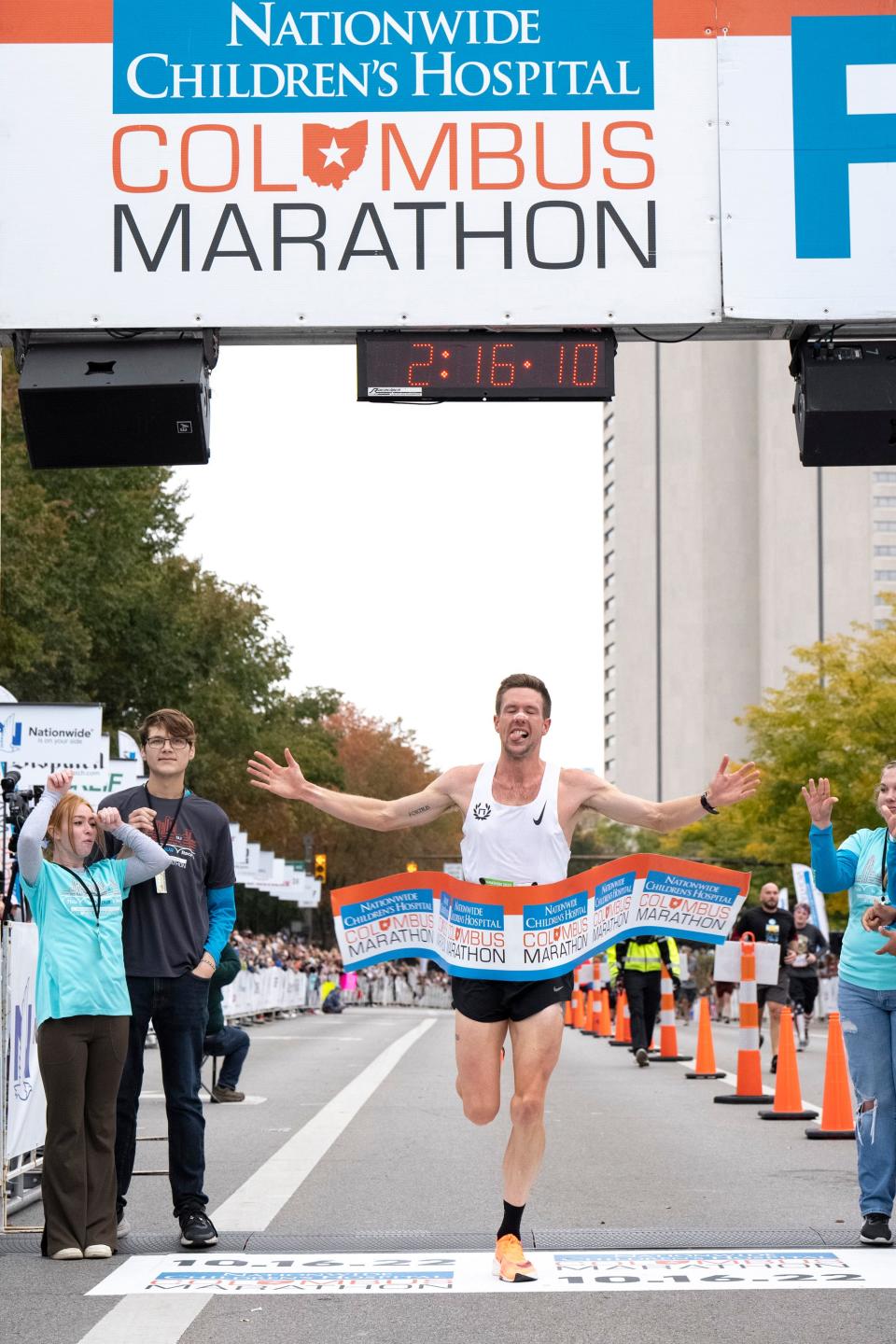 Kristoffer Mugrage crosses the finish line, winning the men’s division of the 2022 Nationwide Children's Hospital Columbus Marathon in a time of 2:16:11.