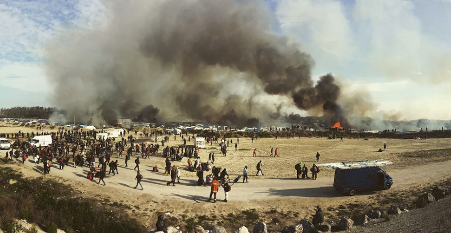 <p>This vivid snap captures evictions from Europe’s biggest migrant camp in northern France. It took first place in the news/events section (Picture: IPP) </p>