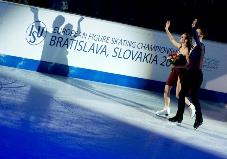 Gabriella Papadakis and Guillaume Cizeron of France celebrate their victory at the European Figure Skating Championships in Bratislava on January 30, 2016